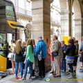 Visitors boarding their Paris sightseeing tour